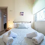 Tina's By 